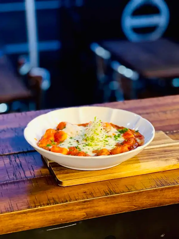 Potato gnocchi baked with napoli sauce and mozzarella di bufala